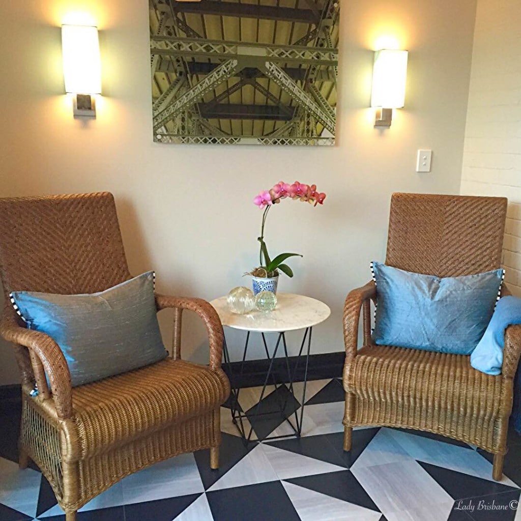 Re-designed checker board floors and cane chairs, typical of the Queensland lifestyle, are featured throughout.